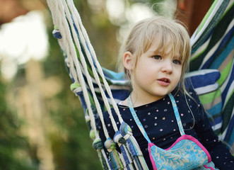 Child in hammock.