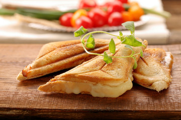 Fresh toast with cheese and herbs