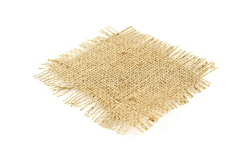 Hessian sack tied with string from low perspective isolated against white background