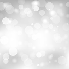 Abstract gray background with a white light blur. Vector