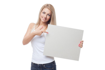 Fototapeta premium Beautiful blond girl holding blank poster