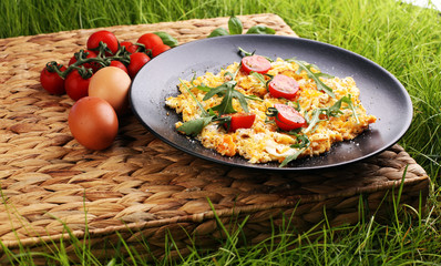 Traditional breakfast - fried eggs,ruccola, tommato- - diet concept scrambled eggs