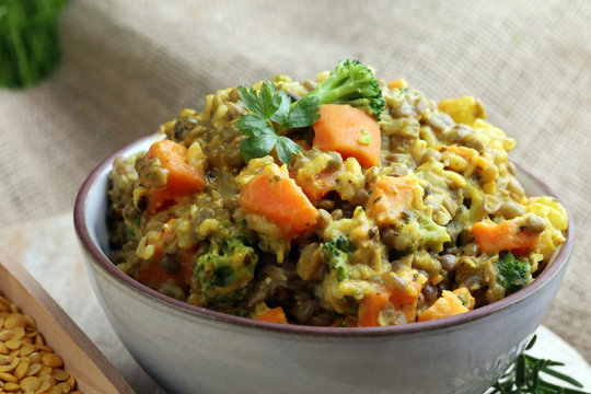 Lentil curry with carrot, cauliflower, broccoli and onion in a bowl. Healthy lifestyle. Diet menu