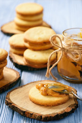 Caramel shortbread cookies on wooden background.