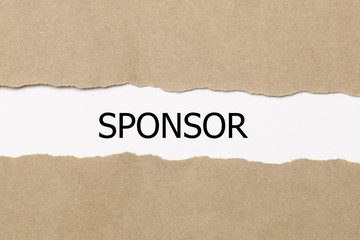 sponsor written under torn paper,  sponsorship concept.