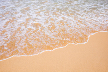 Wave on the sand beach background