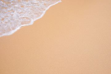 Wave on the sand beach background