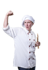Strong young woman chef with her arm up