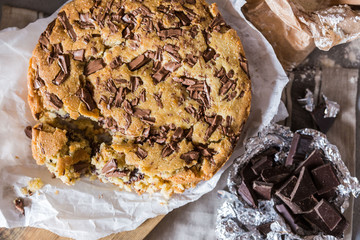 A large pile of homemade chocolate chip cookies top view