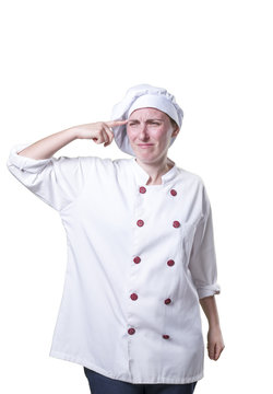 Young woman chef overwhelmed, she has a lot of probems