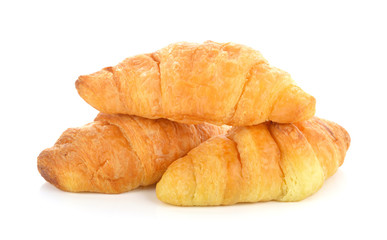 tasty croissant over white background