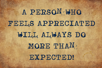 Inspiring motivation quote of a person who feels appreciated will always do more than expected with typewriter text. Distressed Old Paper with Typing image.