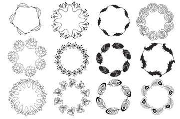 set of hand drawn doodle wreaths. Vector hand drawn illustration black and white.  Design elements for cards, flyers