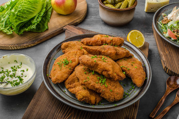 Breaded original schnitzel with waldorf salad