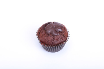 Fresh homemade muffins on white background. Top view.