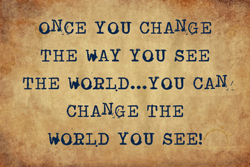 Inspiring motivation quote of once you change the way you see the world...you can change the world you see with typewriter text. Distressed Old Paper with Typing image.