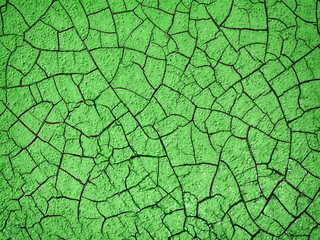 green wall with faults, texture for design background, stone plate