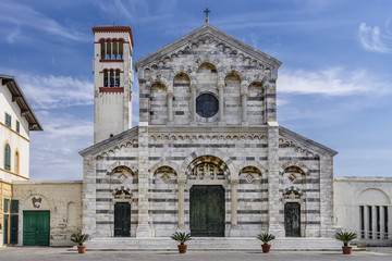 Fototapeta premium The beautiful facade of the church Chiesa di Santa Maria Ausiliatrice, Marina di Pisa, Tuscany, Italy