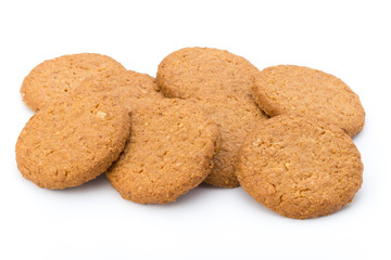Stacked short pastry cookies isolated on white background.