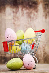 Easter eggs in the cart. Spring discount card.