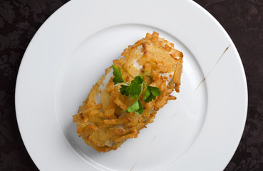 Fried chicken cutlet in breadcrumbs