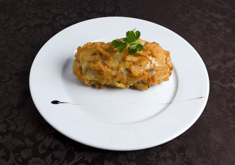 Fried chicken cutlet in breadcrumbs