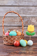 Easter basket and flower cookie. Biscuit on a stick. Healthy Easter tips.
