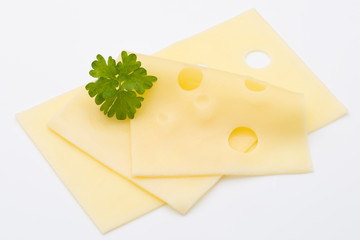 Cheese slices on white background cutout.