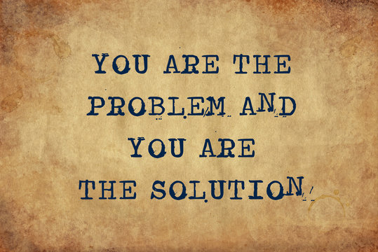 Inspiring motivation quote of you are the problem and you are the solution with typewriter text. Distressed Old Paper with Typing image.