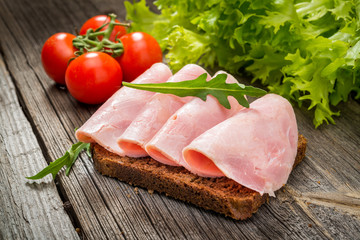 sandwich with ham and vegetables