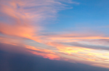 Burning clouds and blue sky after sunset