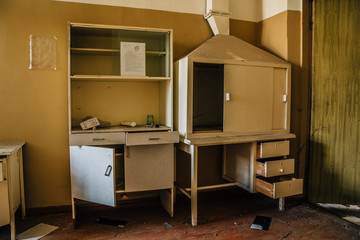 Old furniture in abandoned hospital