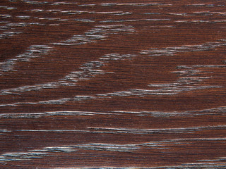 Background, old brown texture with black wooden material with embossed and patterned vintage eco-style