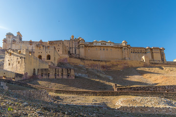 The impressive landscape and cityscape at Amber Fort, famous travel destination in Jaipur, Rajasthan, India. Wide angle view from below.