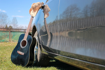 guitar outdoor near car