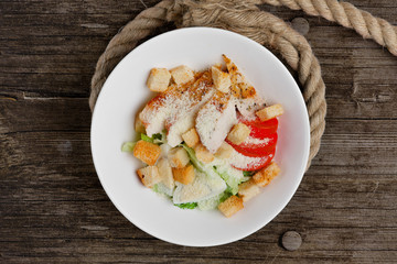 Traditional greek salad on wooden table