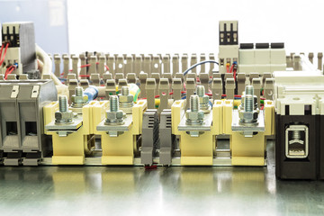 Electrical feedthrough terminals, cables and wires on the artboard.