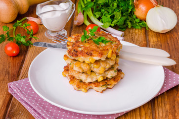 Chicken fritters with corn, onions and fresh herbs
