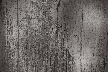 Naklejka premium a unique background texture of cracked white paint on the painted wall