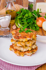 Chicken fritters with corn, onions and fresh herbs