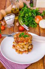 Chicken fritters with corn, onions and fresh herbs