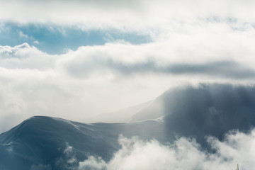 Beautiful winter landscape with snow-topped mountains. Ski resort