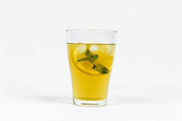Green tea with lemon, mint and pieces of ice 