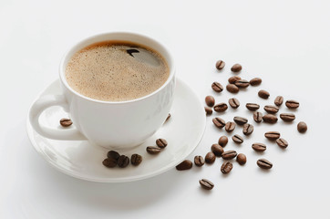 Coffee cup and saucer , coffee beans on a white background.