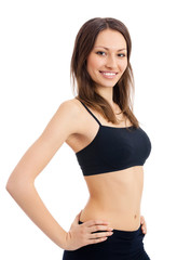 Smiling woman in fitness wear, isolated