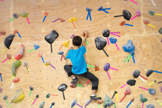 Young Boy Bouldering