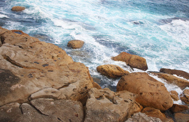 Ocean meets the cliffs