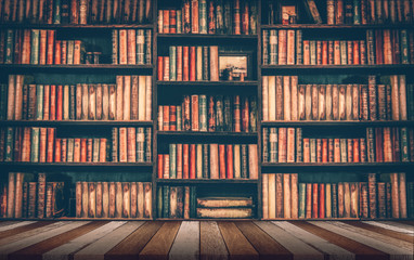 blurred Image many old books on bookshelf in library - obrazy, fototapety, plakaty