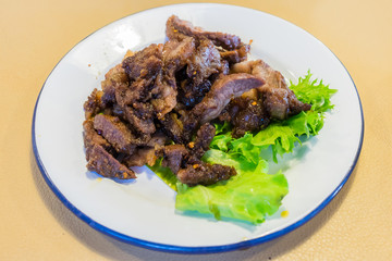 Grilled Thai's Beef sliced on decorated dish called Crying Tiger