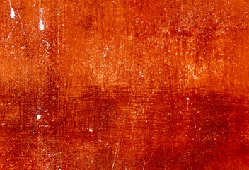 Ancient wall colored by red paint, background, texture